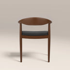 Luma Wooden Carver Dining Chair | Vintage Black Faux Leather & Walnut